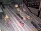 Opposit end of the layout with the Visitor activated Coal train pulled by a Conrail unit, Conrail took over the consoldiated NYC and PRR (Penn Central RR) in 1971