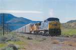 CSX 7776 leads an Eastbound Stack Train at Hafed (track name..town name is Lockwood NV) 