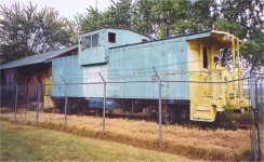 Great Northern Caboose x107 wears the paint of successor Railroad Burlington Northern 10147. Caboose is now on display in Liberal Missouri. Photo taken in October 2004.  S. Roger Kirkpatrick photos.