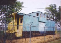 Great Northern Caboose x107 wears the paint of successor Railroad Burlington Northern 10147. Caboose is now on display in Liberal Missouri. Photo taken in October 2004.  S. Roger Kirkpatrick photos.