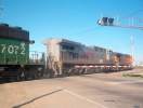 Kansas City Southern 2025 on a WB BNSF at Stockton Mar 13, 2004