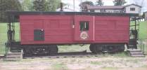 Milwaukee Road Caboose Decorated for the Chicago Great Western RR