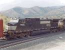 NS 9521 trails on a EB BNSF Manifest