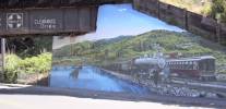 ATSF Steam Era mural painted on the BNSF overcrossing of Tennent Street in Pinole, CA