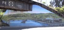 ATSF Steam Era mural painted on the BNSF overcrossing of Tennent Street in Pinole, CA. Terry Clemens photos