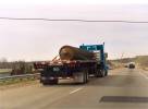 Train wheels on a Truck trailer headed west on Interstate 80 in Ohio