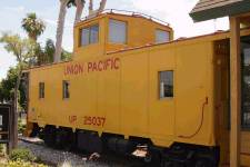 UP 25037 is on display in front of a real estate office in Brea, CA